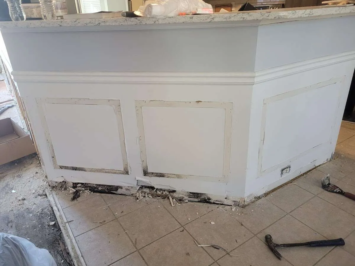 Water damage and mold on kitchen during Storm Damage Restoration in Meredith